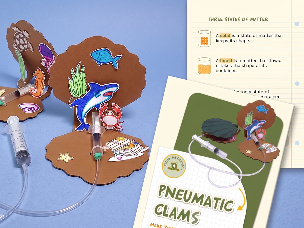 one Origins material pack opened next to its workbook spread, parts laid out in order, top-down, bright