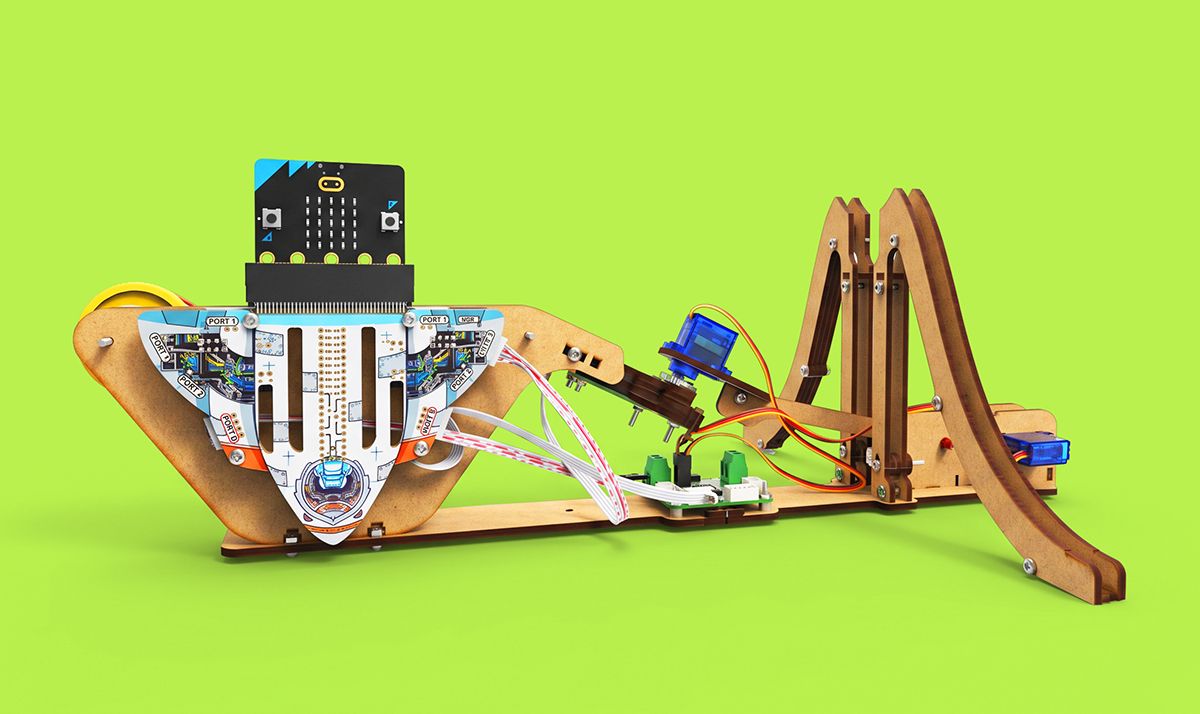 the finished Rock 'n' Roller conveyor and sorting arm, a rock mid-sort, bright background