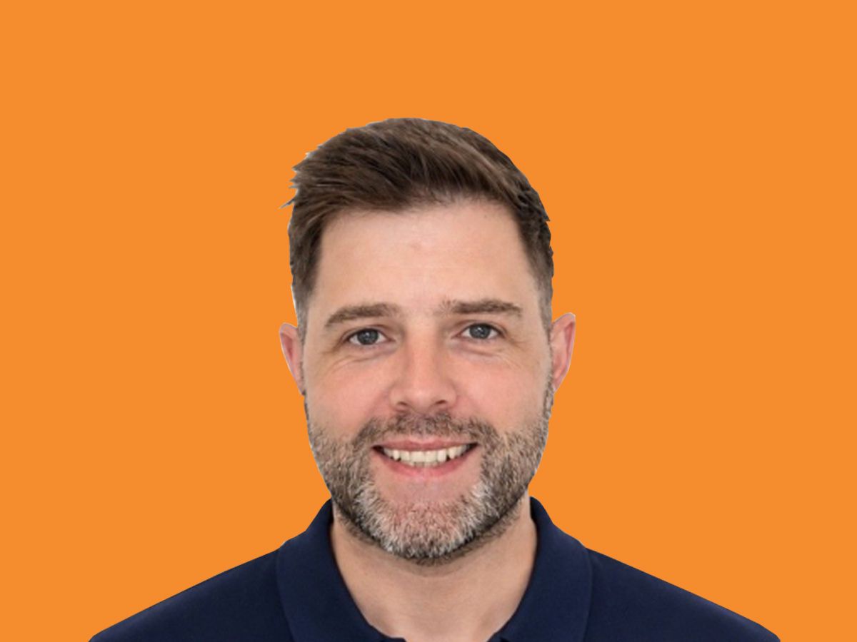 Chris Walshe, head and shoulders, same light and background as Shaun's